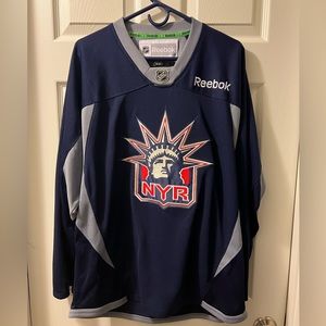 Men’s size Small. Reebok, New York Rangers, alternate warm-up jersey.